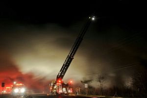 Ladder 58 in operation at night.